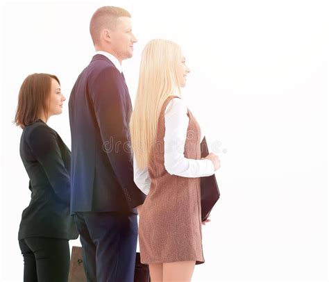 Rear View Group Of Business People Confidently Looking Forward Stock