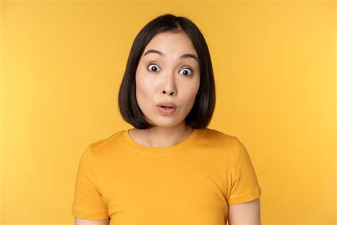 Premium Photo Close Up Portrait Of Asian Girl Showing Surprised