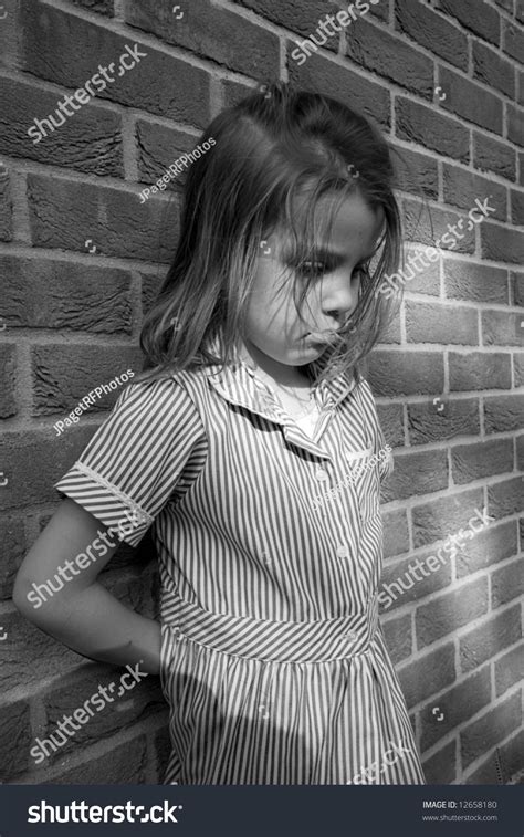 Sad Young Girl Against Brick Wall Stock Photo 12658180 Shutterstock
