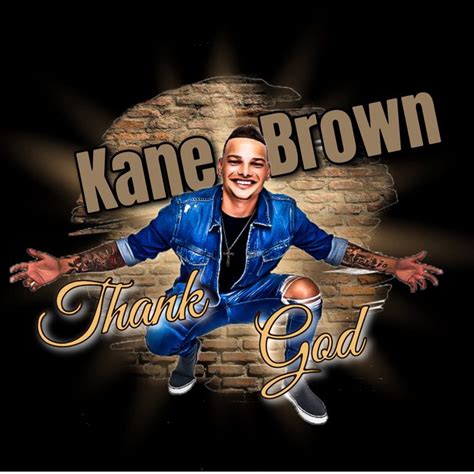 Kanee Brown Thank God With Brick Wall In Background And Gold Lettering