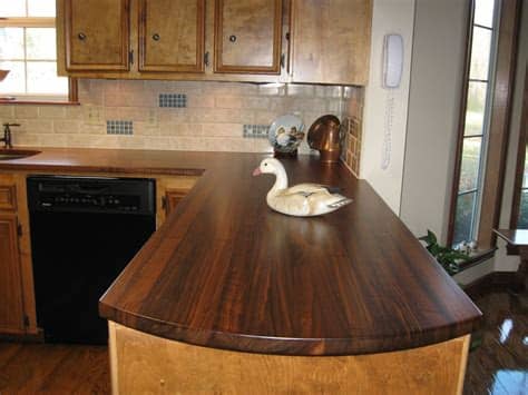 Kitchen cabinetry, granite counter tops, & bathroom remodeling in san antonio, austin, new braunfels, and the boerne/hill country area. Custom Walnut Kitchen Countertops by Craft-Art Direct ...