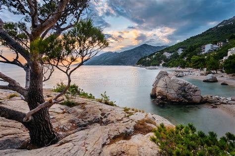 Sunset On The City Of Brela In Croatia A View Of The Cliffs Mountains