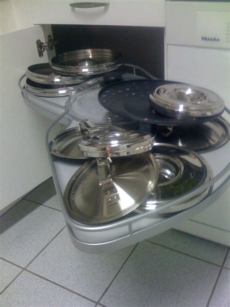 Attach the drawer slide to the side of the cabinet with the end at the back. How to handle the corner cabinet with pull out shelves for ...