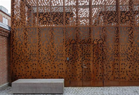 Perforated Corten Panels As Cladding Municipal Building In