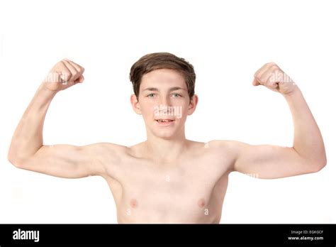White Teenage Boy Flexing His Muscles Showing Off Stock Photo Alamy