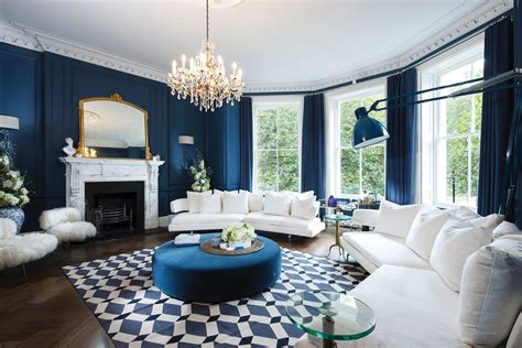 The Blue Living Room With Cream Furniture And Statement Rug Interior