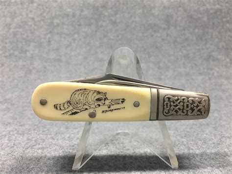 What Is A 1980s Schrade Scrimshaw Sc506 Raccoon Barlow Pocket Knife Worth