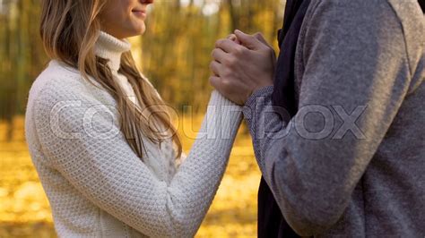 Man Gently Warming Hands Of His Beloved Stock Image Colourbox