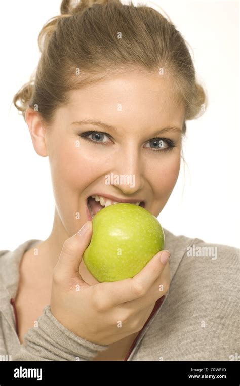 Woman Eats Apple Stock Photo Alamy