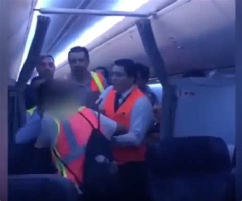 passenger attacks cabin crew plane makes emergency landing