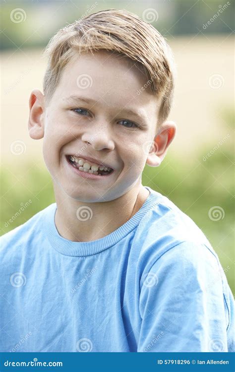 Outdoor Head And Shoulder Portrait Of Smiling Boy Stock Photo Image