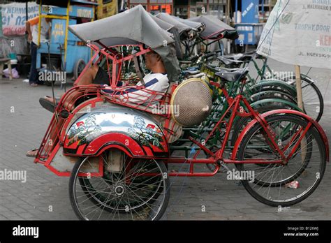 Becak Driver On The Street Of Yogyakarta Jogja Java Indonesia Stock
