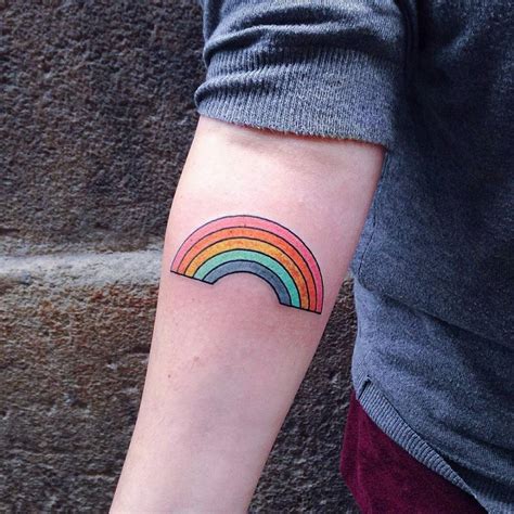 Rainbow Tattoo On The Right Inner Forearm