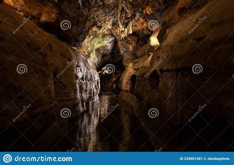 Exploring Underground Caves With Stalactite And Stalagmite Growth Stock