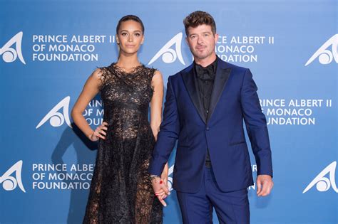 Robin Thicke’s Fiancee Comments On Video Of Him Hugging Khloe Kardashian