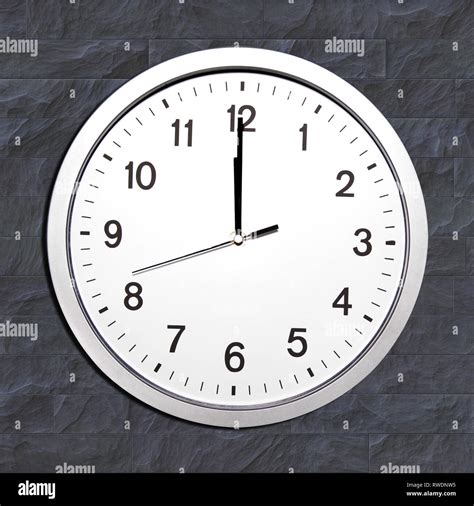 Wall Clock Set At Noon Or Twelve O Clock Stock Photo Alamy