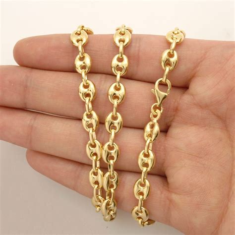 Plated gold chains are cheaper, but the plating will wear off after some time, exposing the metal underneath, and you will need to have the chain replated if you want to restore its color. 14k Yellow Gold 6.5mm Puffed Anchor Mariner Chain Necklace 20″-28″ Lobster Clasp | Best Men Gold ...