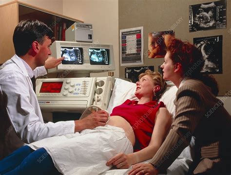 ultrasound scanning of a pregnant woman stock image m406 0141 science photo library