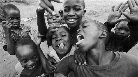 This Photograph Captures The Joy And Happiness Of A Group Of Children