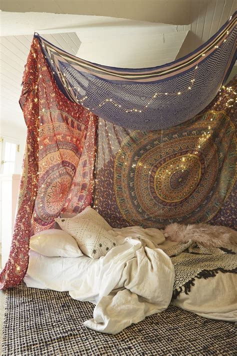 Hanging a ceiling tapestry can give a very special touch and transformation to your room and living space. UO DIY: Tapestry Canopy | Boho room, Diy tapestry, Boho