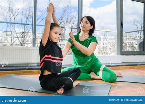 Woman Make Stretching With Tween Girl Indoors Stock Photo Image Of