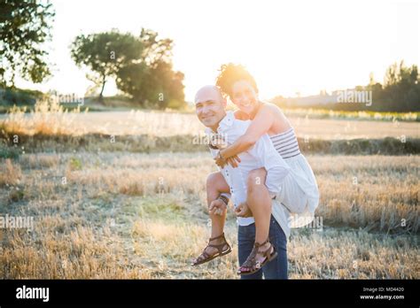 Man Carrying Woman Hi Res Stock Photography And Images Alamy
