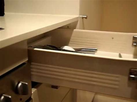 If the door has a simple hinge setup on the back, trim that side off instead. Blumotion soft-close drawer retrofit - YouTube