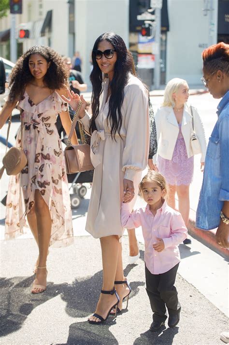 Kimora Lee Simmons Stuns In A Beige Dress For Lunch With