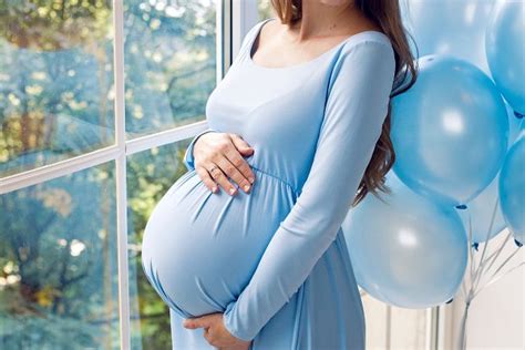 Beautiful Young Pregnant Girl In Blu High Quality People Images