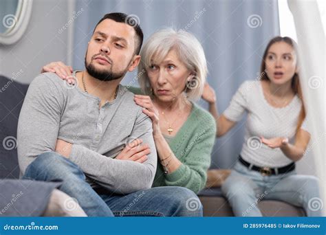 elderly mother comforts her son after his quarrel with his wife stock image image of mother