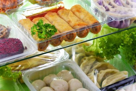 A Variety Of Prepackaged Food Products In Plastic Boxes Stock Photo