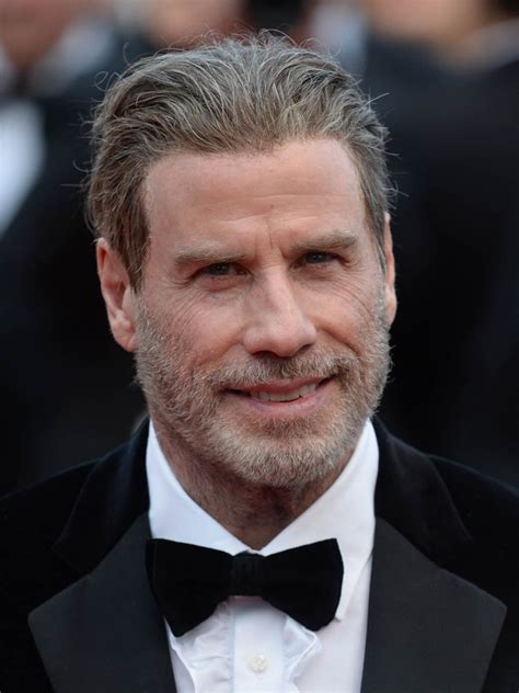 His father was of italian descent and his mother was of irish ancestry. John Travolta's Cannes hair and Cannes moves