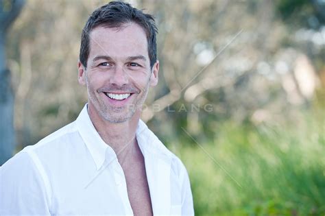 portrait of a good looking middle aged man surrounded by nature rob lang images licensing and