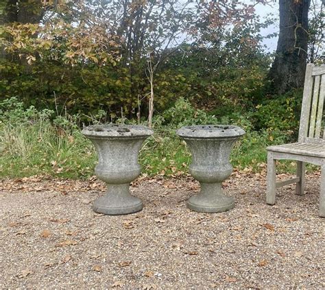Pair Of Simple Weathered Urns
