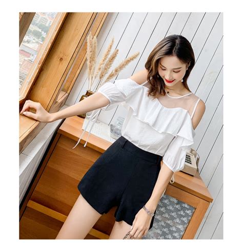 Ada blouse pesta brokat juga sis. jual blouse wanita import