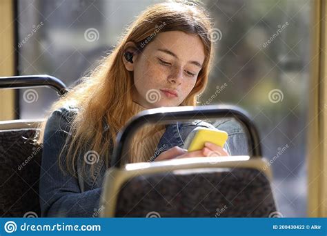 girl a passenger sitting behind female motorcyclist on a bike cheerful females riding on the