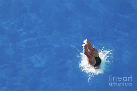 Woman Diving Into Pool Photograph By Microgen Imagesscience Photo