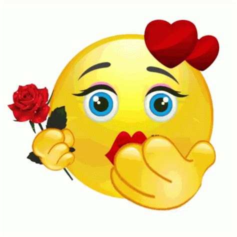 A Yellow Emoticure Holding A Red Rose
