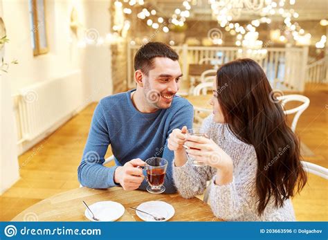 Happy Couple Drinking Tea At Cafe Stock Photo Image Of Happy Latin