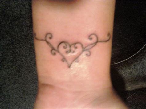 Beautiful two hearts on wrist. 60 Hearts Tattoos For Wrists
