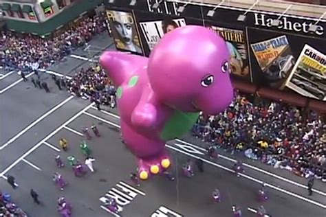 Barney The Dinosaur Balloon Ripped To Pieces By The Wind During The