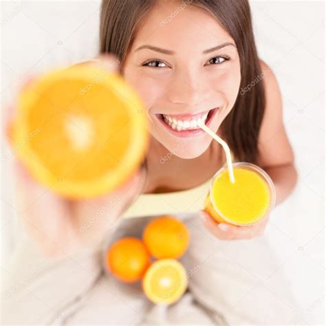 Orange Juice Drinking Woman Stock Photo By ©ariwasabi 21568271