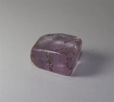 Some pieces of gibeon show a twisted and distorted pattern which reveals much about the forces which torm the mass apart as it plunged to earth. Kunzite 10