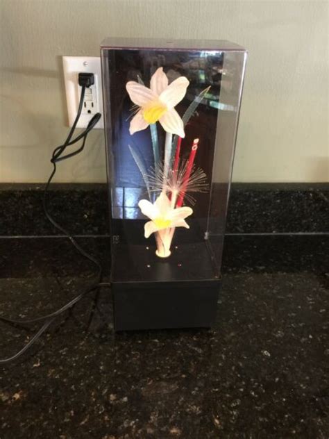 Each flower was composed of a fiber optic cable running through some clear plastic tubing with a translucent plastic bulb on top. Vintage Fiber Optic Flowers Color Changing Lamp & Music ...