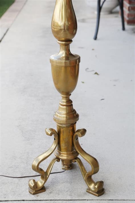 A brass floor lamp can work in just about any room in the house. Vintage Chapman Solid Brass Floor Lamp at 1stdibs