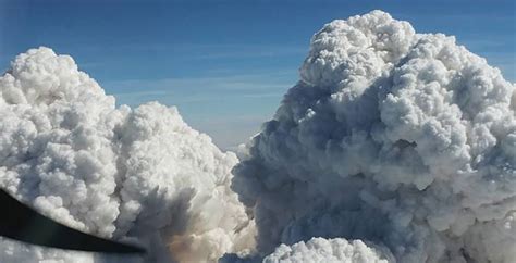 To 100 hectares as of 9 p.m. This is what the BC wildfires look like from 25,000 ft. in ...