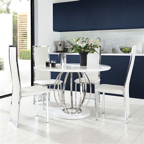 Our selection includes elegant armchairs, voluminous lounge chairs, airy rattan chairs and authentic classics from top brands of contemporary scandinavian design. Savoy Round White High Gloss and Chrome Dining Table with ...