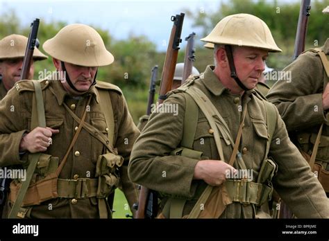 Group Of Ww1 British Reenactment Group Simulate Marching To The Front
