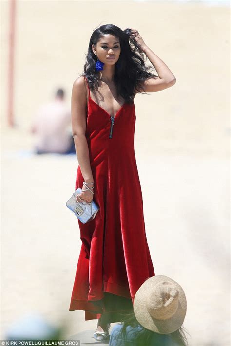 Chanel Iman Goes Braless In Extreme Plunging Red Velvet Dress In Sydney