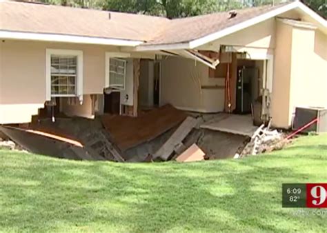 Massive Sinkhole Swallows Part Of Home In Apopka Florida
